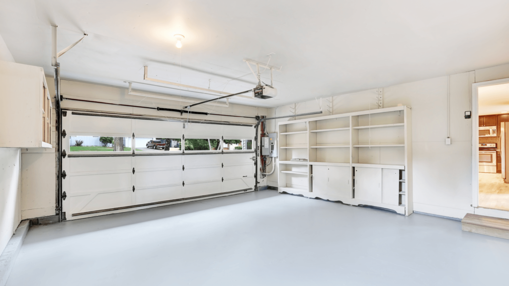 Grey+flake+epoxy High-quality epoxy garage flooring transformation by Ascent Epoxy Miami, showcasing durability and stylish designs.